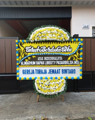 Papan Bunga Duka di Sumber Jaya